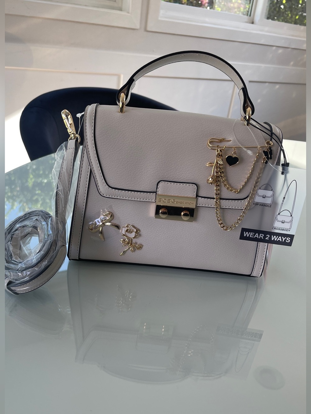 BCBGMaxAzria Ivory Top-Handle Satchel with Black Trim & Gold Accents